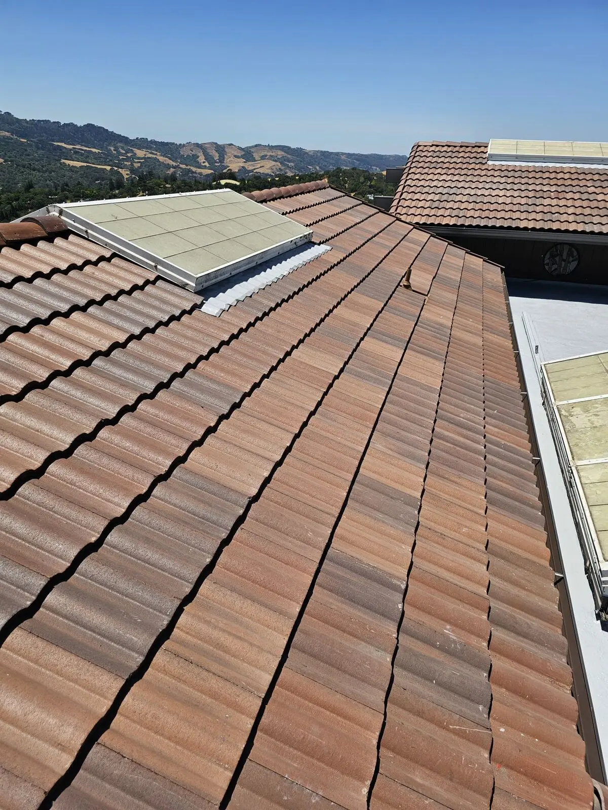 Modern Tile Roof With Skylight Overlook